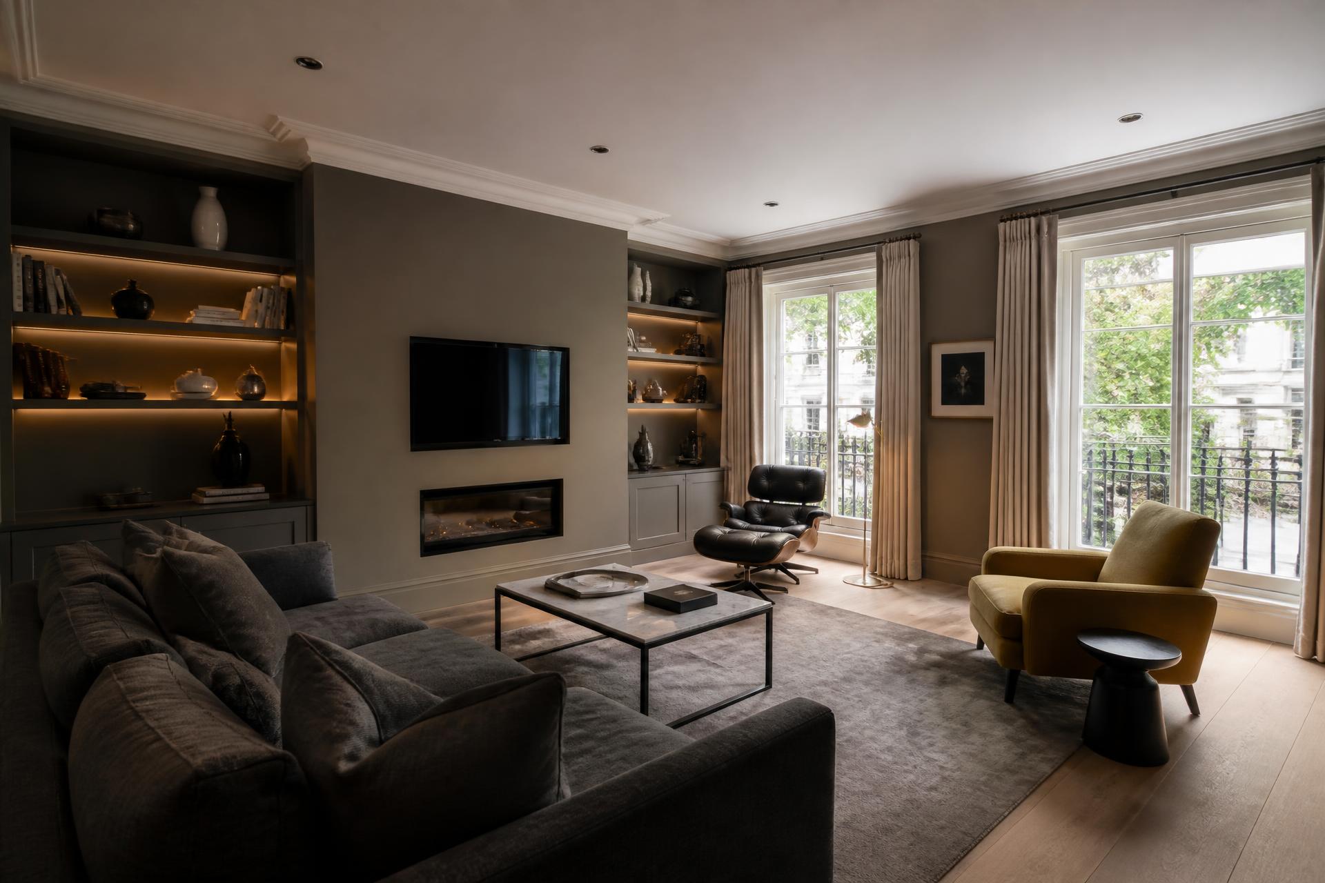 Refurbished living room interior with warm lighting and oak flooring
